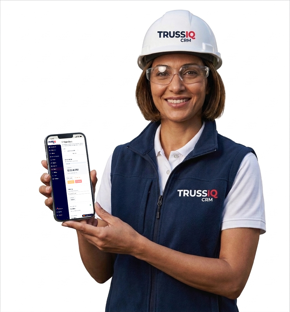 A field worker in a hard hat holding a phone showing the TrussIQ Time Clock screen